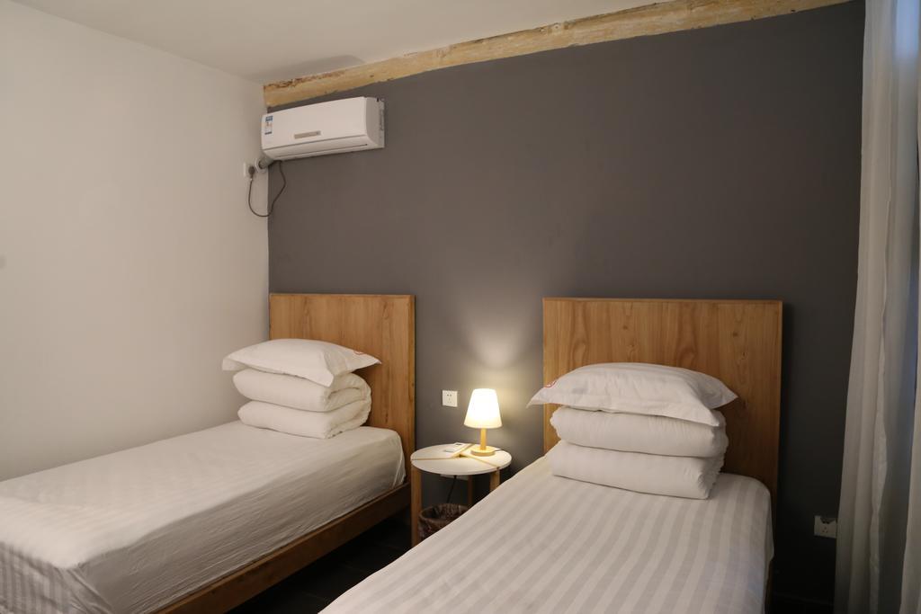 Beijing Wohkoon Hostel-Nan Luo Gu Xiang Branch Екстер'єр фото